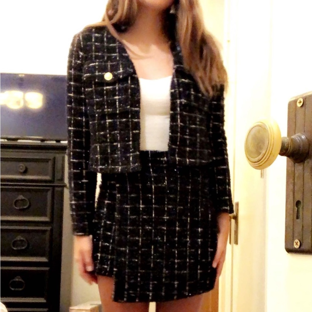 Black two piece jacket and skirt